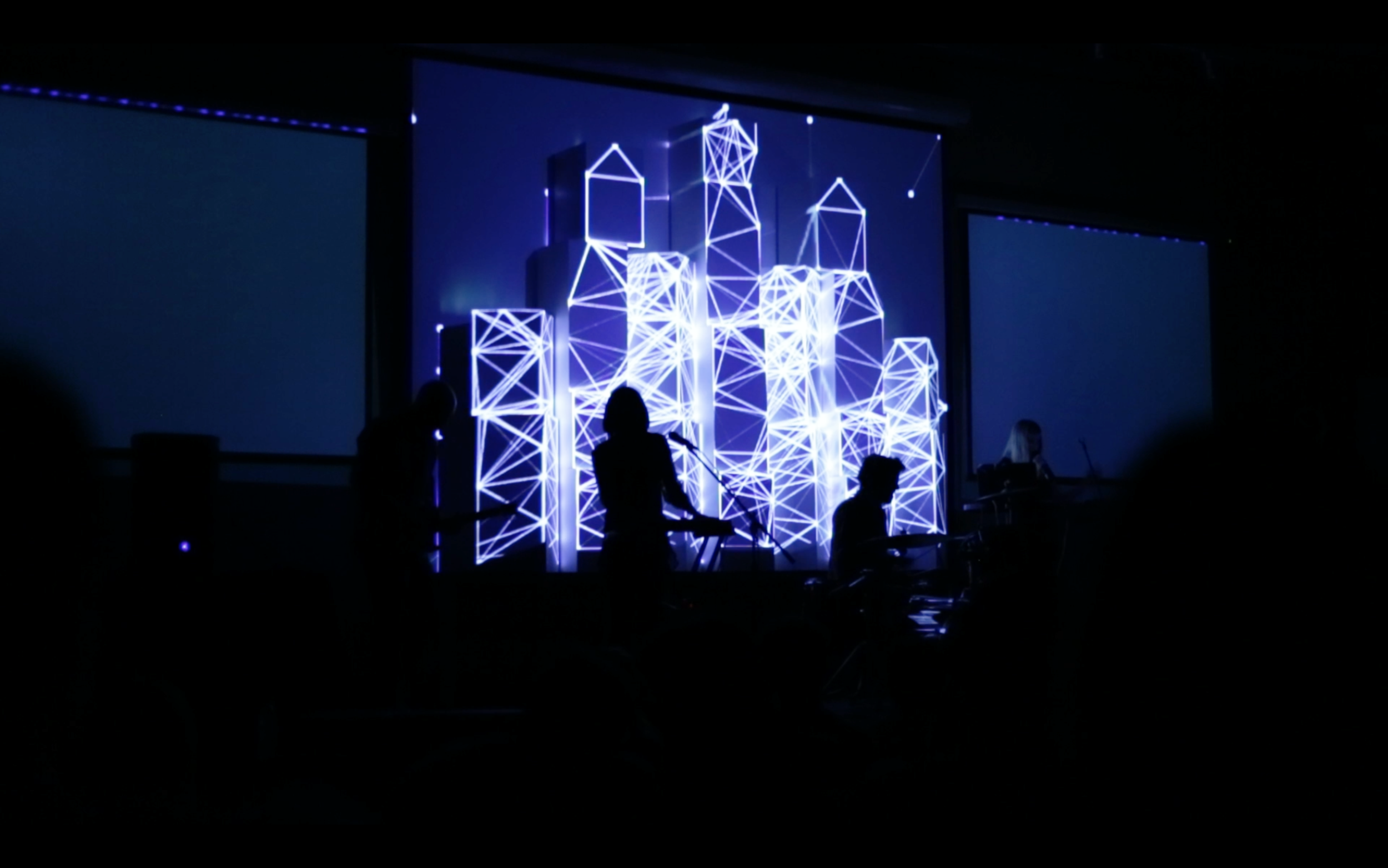 Documentation of the Lituania Lituania audiovisual performance with live music and projected visuals.